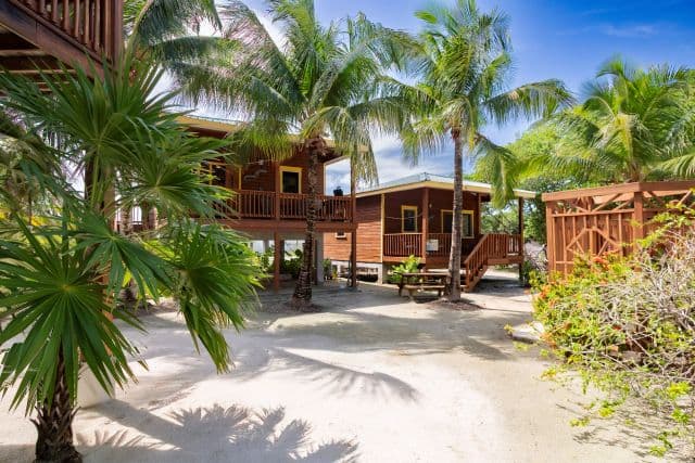 Luxury 3-Bedroom Home with Two Turnkey Income-Producing Rental Units, Sea-views and Private Beachfront Access