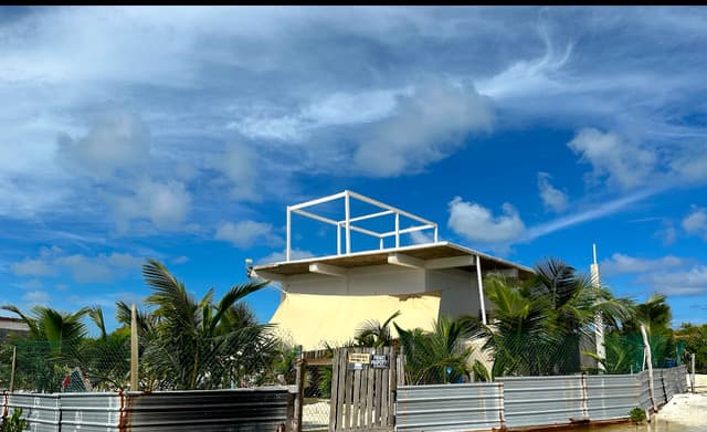 Western Sea and Sunset View lot including a One Bedroom Project Home β North Caye Caulker